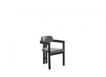 A state-of-the-art chair with an unusual shape and interesting legs with a comfortable gray-black backrest for the dining room.